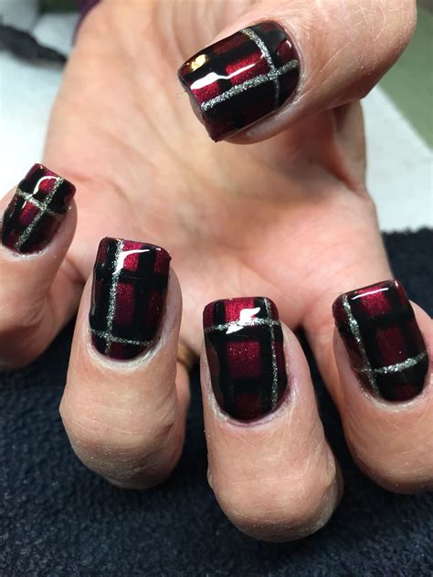 This could be black toenail melanoma. Burgundy black and gold plaid nails | Plaid nails, Toe ...