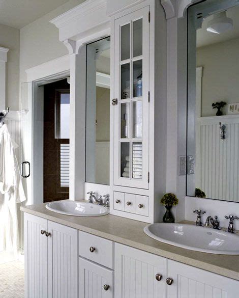 In addition to drawing the eye upward. Center tower between double sinks for extra storage. Love ...