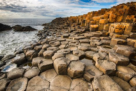 The rocky coastline around the giant's causeway has caused many shipwrecks. Basalt Columns at Giants Causeway, County Antrim, Northern ...