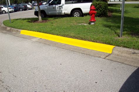 Recent Job By The Csgconsvcgrp Team Painted Speed Bumps Curbing And