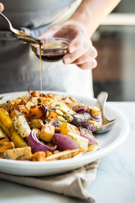 We turn to the hearty blond root vegetables like potatoes (in all their exciting variety), celeriac, and parsnips, that are so good at absorbing sauces and dressings, and retaining the flavors we pair them with. Easy Rosemary Maple Balsamic Roasted Vegetables | Recipe ...