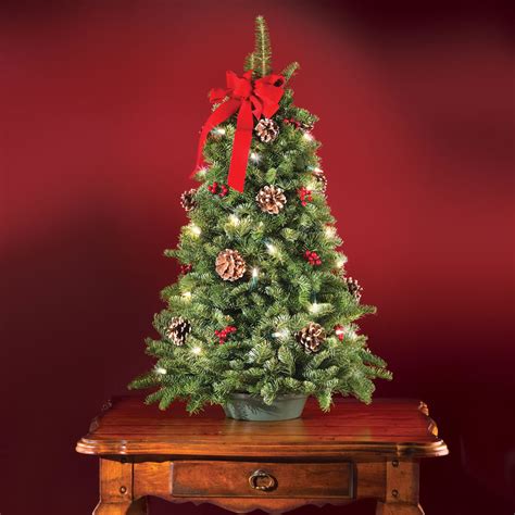The Freshly Cut Prelit Tabletop Tree - Hammacher Schlemmer
