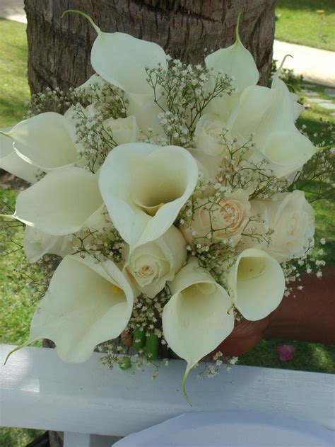 Absolutely adore this large, fluffy bridesmaid's bouquet. Bouquet Bridal: White Calla Lilies, Roses and Baby's ...
