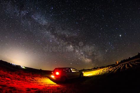 Beautiful Milky Way Sky Landscape With Car In Foreground Stock Photo