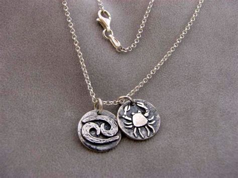 Can be worn solo or layered under other fine gold pieces. Sterling Silver Cancer Zodiac Sign Necklace