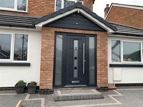 Garage doors that look like wood but are not. This particular garage doors with windows is honestly a ...