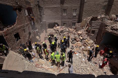 At Least 13 Killed In Building Collapse In Cairo