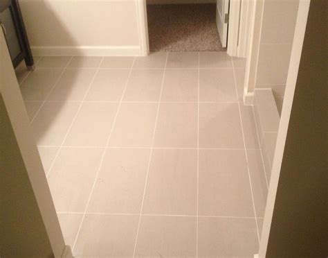 So if you have ever struggled with how to layout floor tile in a small bathroom when you don't want to tile yourself into a corner, check out my tips below. Image result for 12 x 24 tile laid straight | Tile floor ...