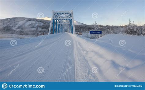 Bridge Over The Kolyma River In Kolyma Yakutia Russia Stock Image
