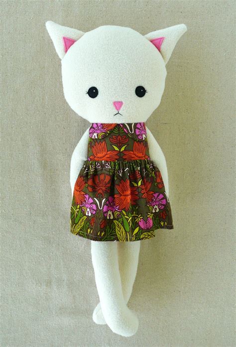 Sew an entire menagerie of stuffed animals with our photo gallery of 100+ free stuffed animal sewing patterns. Fabric Doll Rag Doll Cat Doll in Floral Dress by ...