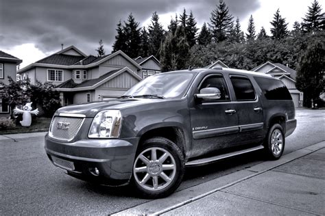 The vehicle is carbon black metallic with a ebony full leather interior. 2010 GMC Yukon Denali - Pictures - CarGurus