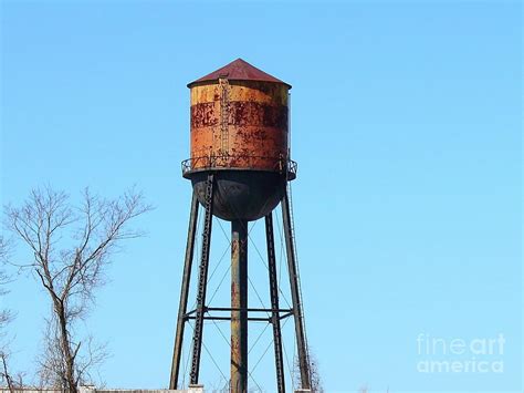 A Weathered And Rustic Water Tower In Keyport New Jersey Photograph By