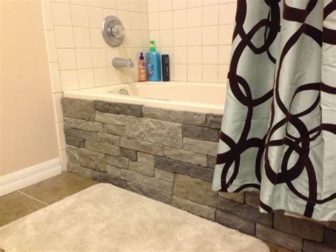 Bathtub surrounds are easier to install, cost less than tiles, can add a stylish look to your bathroom and make your bathroom easier to clean. We love this DIY project using AirStone on a tub. #Lowes # ...