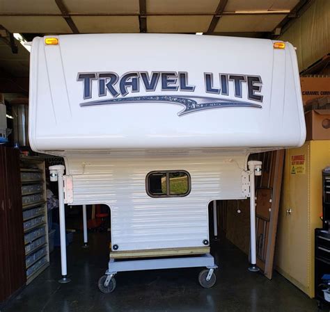 I also used youtube to achieve the first priority was building a better curtain solution, so i made blackout curtains that fit into the shape of each window from insulation and a black sheet. 25 Dream RV Garages For Campers - Truck Camper Magazine - 9