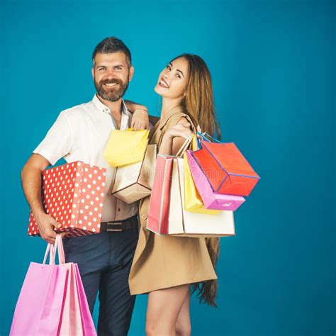 Couple In Love Hold Shopping Bag Near Blue Wall Stock Image Image Of
