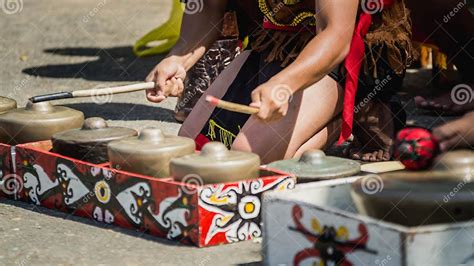 Dayak Traditional Tribe Of Borneo Artists Playing Gong Traditional