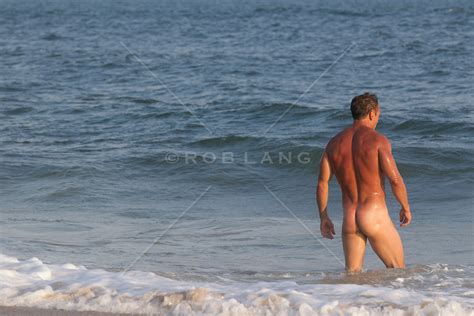 Muscular Naked Man In The Ocean ROB LANG IMAGES LICENSING AND