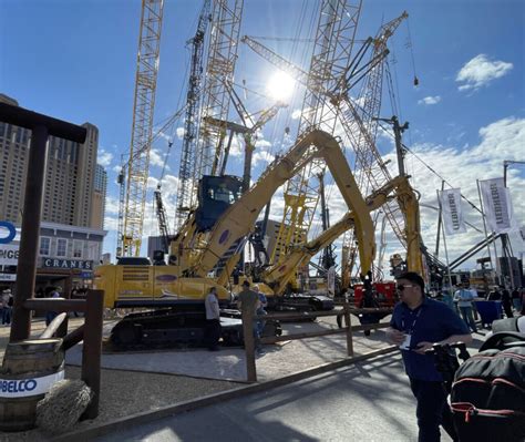 Full Range Of Kobelco Crawler Cranes And Excavators Displayed On The