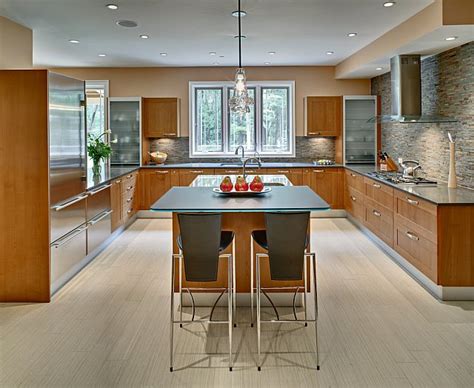 The designer has created a kitchen island which acts as a dining table and also a preparation area for your meals. Which kitchen layout is the right fit for me?