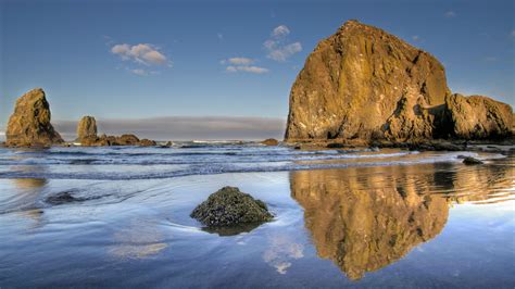 Reflection Of Haystack Rock At Cannon Beach Oregon Usa Windows