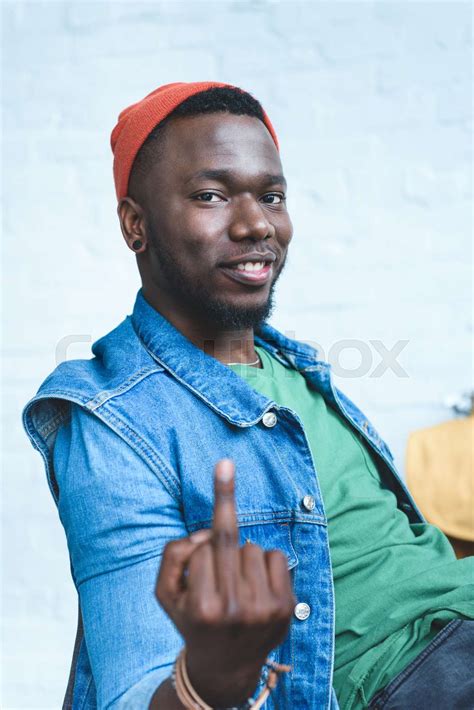 Young Man Showing Middle Finger Stock Image Colourbox