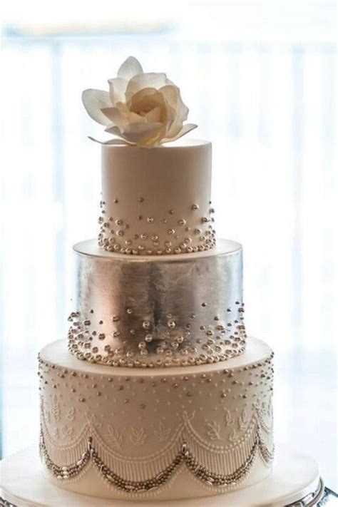 Our favorite type of wedding cake is the kind that makes a statement by adding to your wedding décor. 5 Hottest Wedding Cake Types Of 2014 - Weddingomania