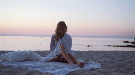 Blonde Girl Enjoying Beach At Golden Hour Stock Footage SBV
