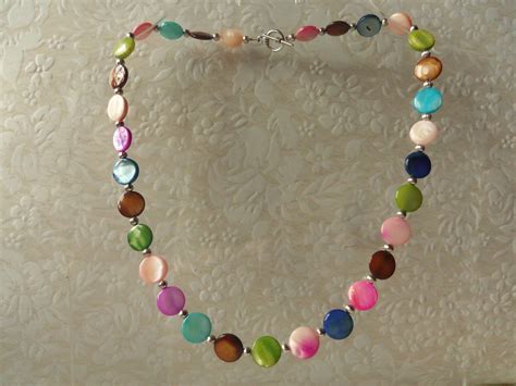 Supposed to be aristocratic and proper but is curious and. Multi colour shell necklace - great colours www ...