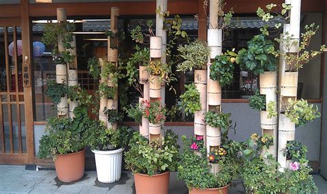 Treat yourself to a work of art. Bamboo vertical Wall planter. | Vertical garden, Vertical ...