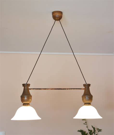 When you have a house of a certain age (30 years height above table. Dining table light, pendant light, wooden light fixture ...