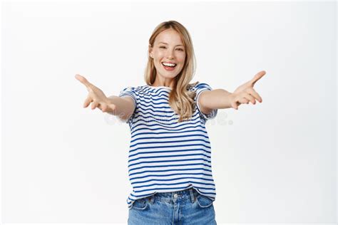 Come Here Friendly Happy Young Woman With Lovely Smile Extending Reaching Hands Forward In