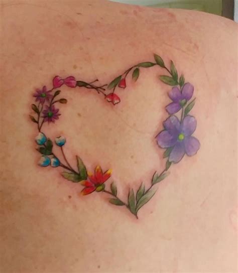 Heart And Flowers Tattoo On Shoulder Tattoosonback Heart Flower