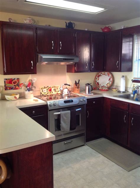 Here you may to know how to stain kitchen cabinets white. Look what Courtney did with General Finishes Gel Stain ...