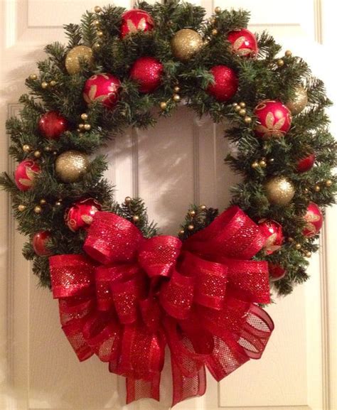 Keep the soil evenly moist while your plant is blooming, misting it frequently. Red with gold Christmas wreath by Enywear on Etsy, $67.50 ...