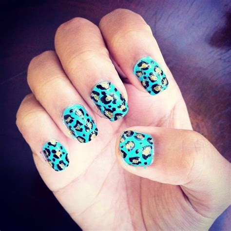 Turquoise glitter gradient stud nails. Turquoise and gold cheetah #nail #nailart #glitter # ...