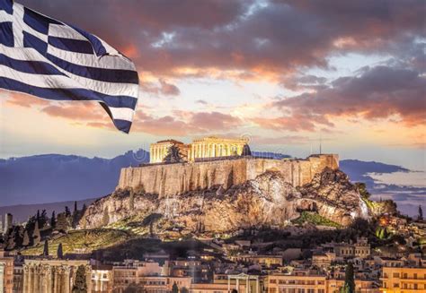 Acropolis With Parthenon Temple Against Greek Flag In Athens Greece