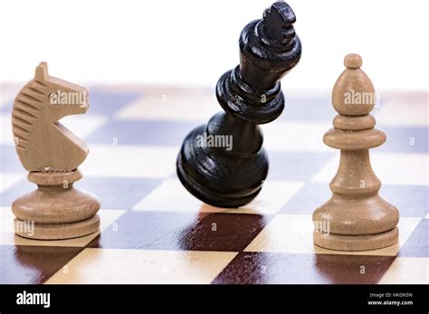 Checkmate Game Of Chess With A Falling King Stock Photo Alamy