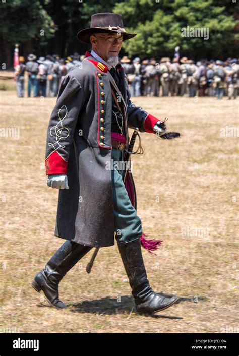 Man Walks In Confederate Officer Uniform During Civil War Reenactment