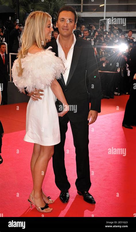 Dany Brillant And His Girlfriend Nathalie Moury Arriving At The Palais Des Festivals In Cannes