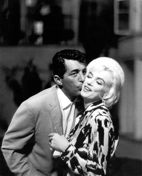 Dean Martin Kissing Marilyn Monroes Cheek On The Set Of Somethings