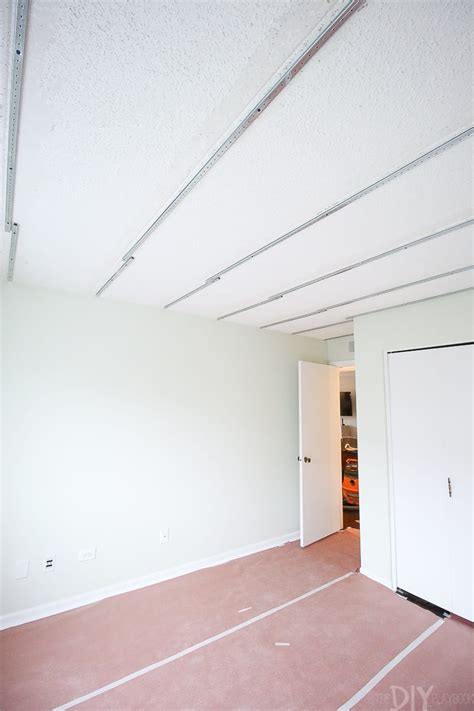 How to remove a popcorn ceiling. How to Install Ceiling Planks to Cover Popcorn Ceilings ...