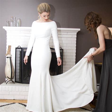 Style 8936 Crepe Long Sleeved Wedding Dress With Beaded Illusion Back
