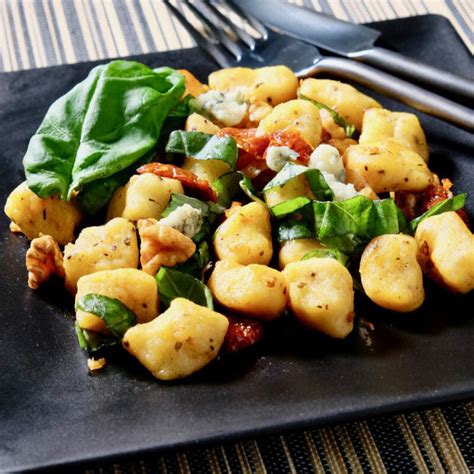 Pan Seared Gnocchi Gorgonzola Sun Dried Tomatoes Basil And Walnuts