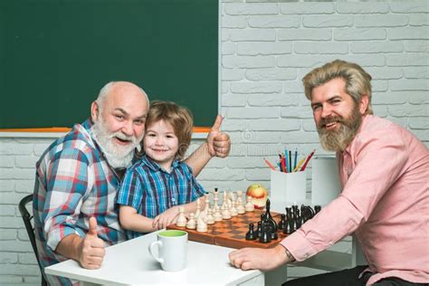 Father And Son With Grandfather Playing Chess Back To School Men