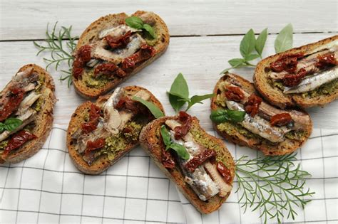 wholesome girls sardine sandwiches with pesto and sun dried tomatoes