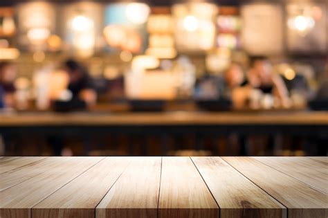 Premium Photo Wooden Table With Blur Background Of Coffee Shop