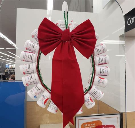 Christmas Wreath I Made For The Pharmacy Out Of Pill Bottles Pharmacy Decor Unusual Christmas