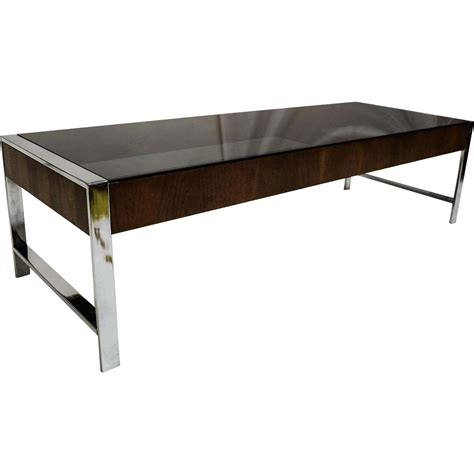 Glass coffee tables are trending as furniture pieces that are now used in everyday homes. Mid Century Chrome Smoked Glass Coffee Table Milo Baughman ...