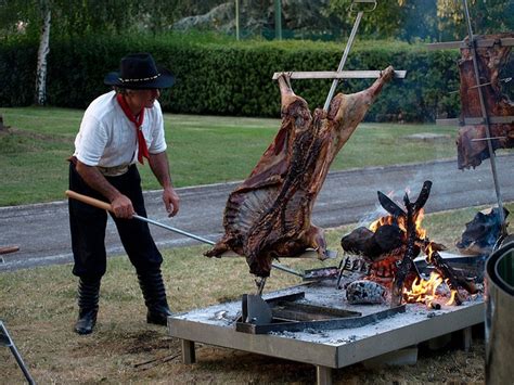 Lamb Grilled Cook On Stake Over A Fire Argentine Style Argentina