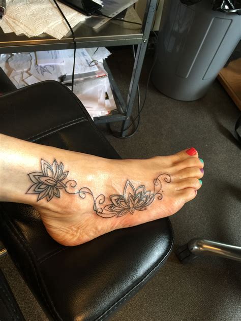 gorgeous lotus foot tattoo not finished yet but love it cute foot tattoos leg tattoos sleeve